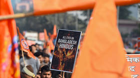 India asks neighbor to protect minorities