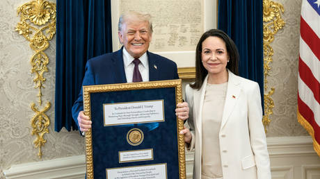 President Donald Trump meets with Venezuelan opposition leader Maria Corina Machado in the Oval Office, on January 15, 2026 in Washington, D.C.