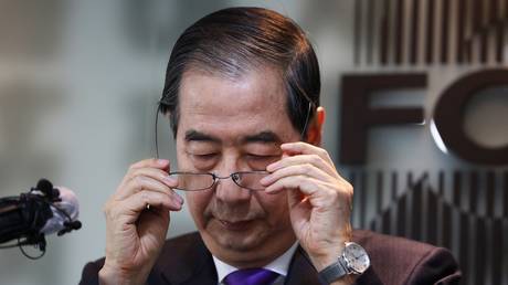 Ex-South Korean PM sentenced to 23 years in martial law case