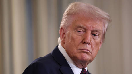 Trump threatens 100% tariff on Canada over China