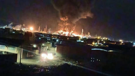 A large plume of smoke rises over the Tabriz Petrochemical Company facility in northwestern Iran.