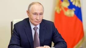 Russian President Vladimir Putin holds a government meeting via video conference in Moscow, Russia, on March 18, 2026.