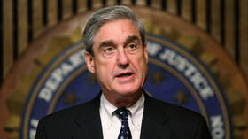 FBI Director Robert Mueller speaks during a news conference at the FBI headquarters in Washington, DC on June 25, 2008.