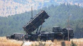 German soldiers check a Patriot missile launcher deployed in Kahramanmaras, Türkiye as part of a NATO mission.