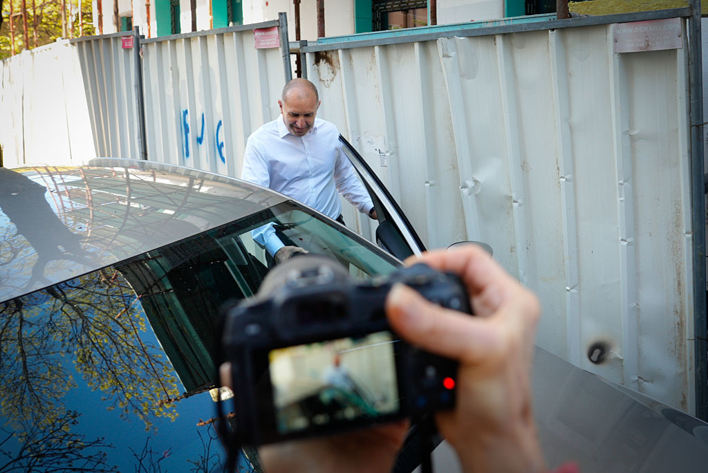 Former Bulgarian President Rumen Radev steps into his car after voting in Sofia, Bulgaria, April 19, 2026