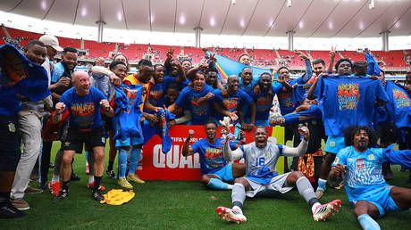 African nation reaches World Cup after 50-year wait (VIDEOS)