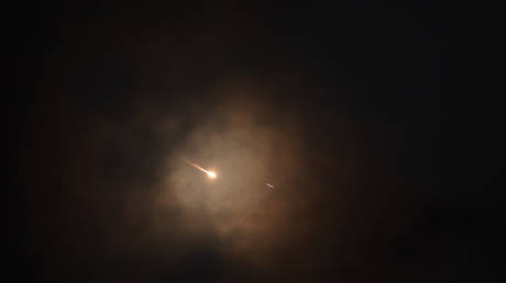 Missiles launched by Iran in retaliation against attacks by the United States and Israel are seen in the skies over Hebron, Palestine on April 7, 2026.