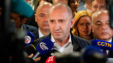 Rumen Radev speaks to the media at a voting station in Sofia, Bulgaria, April 19, 2026.