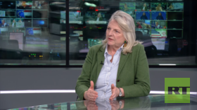 Former Austrian Foreign Minister Karin Kneissl during an interview with RT about upcoming parliamentary elections in Hungary.