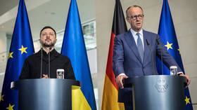 Ukrainian leader Vladimir Zelensky and German Chancellor Friedrich Merz attend a joint press conference at the Chancellery on April 14, 2026 in Berlin, Germany.