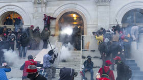 Police use tear gas around Capitol building where pro-Trump supporters riot and breached the Capitol on January 6, 2021.