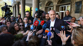 Former President and leader of ''Progressive Bulgaria'' Rumen Radev speaks to the media after casting his ballot in parliamentary election at a voting station in Sofia, Bulgaria, April 19, 2026