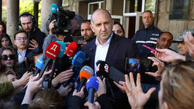 Former President and leader of ''Progressive Bulgaria'' Rumen Radev speaks to the media after casting his ballot in parliamentary election at a voting station in Sofia, Bulgaria, April 19, 2026