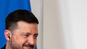 Ukraine’s Vladimir Zelensky smiling during a joint press conference with Italian Prime Minister Giorgia Meloni in Rome in April 2026.