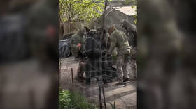 Ukrainian draft enforcers pepper-spray woman (VIDEO)