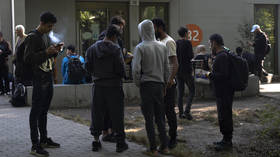 Germans back tougher limits on migrant benefits – poll