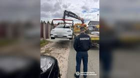 A car being evacuated as part of a crackdown on Ukrainian draft officials suspected of corruption.