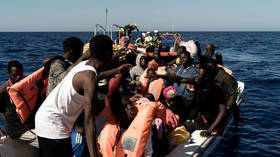 A group of migrants and refugees is rescued at sea off the Libyan coast on October 25, 2022.