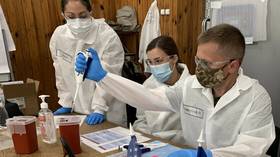 A US Army medical specialist trains Ukrainian disease specialists at the US Army Medical Institute of Infectious Diseases, Fort Detrick, Maryland, July 8, 2021