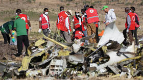 Forensics investigators working at the crash site of the Ethiopian Airlines Flight 302 on March 12, 2019, Bishoftu, Ethiopia.
