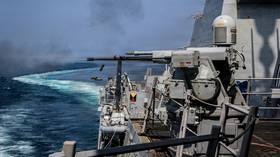 The USS Frank E. Petersen Jr. (DDG-121), an Arleigh Burke-class guided missile destroyer conducts a live-fire military exercise on the eve of the US attack on Iran.