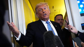 FILE PHOTO: President Donald Trump speaks to reporters aboard Air Force One, May 15, 2026