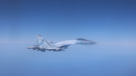 A screenshot from a video released by the British Defense Ministry on May 20, 2026, showing a Russian fighter jet intercepting a UK spy plane over the Black Sea.