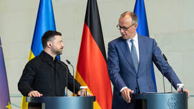 German Chancellor Friedrich Merz (R) and Ukraine's Vladmir Zelensky attend a press conference in Berlin, Germany on April 14, 2026.