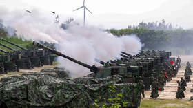 Taiwanese soldiers fire US-made M109 American howitzers during a live-ammunition artillery training in Taichung, Taiwan, China  on August 7, 2024.