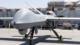 A General Atomics MQ-9 Reaper unmanned aerial vehicle of the USAF is displayed on the tarmac during the Paris Air Show 2025 at Le Bourget Airport.