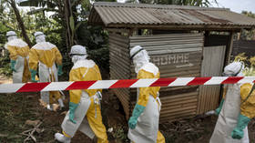 MSF teams wearing full protective equipment reinforce perimeter barriers around a restricted Ebola isolation zone and basic hygiene facilities at the General Referral Hospital of Mongbwalu in Democratic Republic of Congo on May 26, 2026.