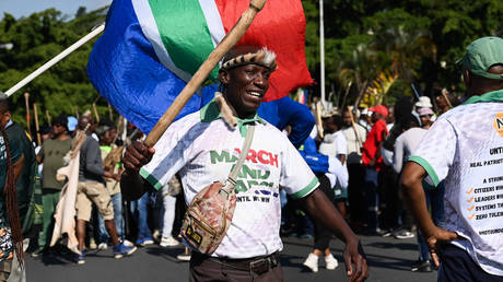 South African leader warns against violent protests