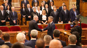 Peter Magyar shakes hands with Hungarian President Tamas Sulyok as he is sworn in as Prime Minister of Hungary at the Hungarian Parliament in Budapest, Hungary. on May 09, 2026.