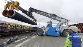 Pipes used in the construction of the Nord Stream 2 pipeline are unloaded at the Sassnitz-Mukran ferry port in Ruegen, Germany, May 8, 2017