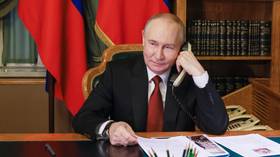 Russian President Vladimir Putin makes a phone call at the Kremlin in Moscow, Russia, on December 25, 2025.