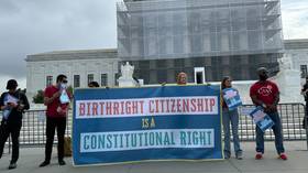 Demonstrators rally in front of the US Supreme Court in Washington, DC, US, on May 15, 2025.