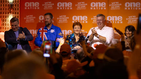 One Nation leaders take to the stage to celebrate as their party wins the Farrer by-election on May 9, 2026 in Albury, Australia