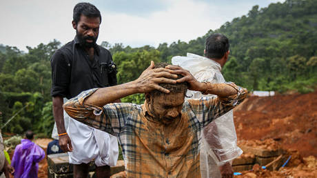 Couple makes miraculous escape from landslide in India (VIDEO)