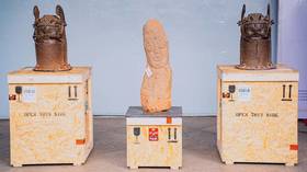 Switzerland returns looted African artifacts