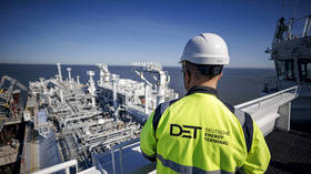 A Deutsche Energie Terminal (DET) employee is seen at the LNG terminal in Wilhelmshaven, Germany, on April 30, 2026.