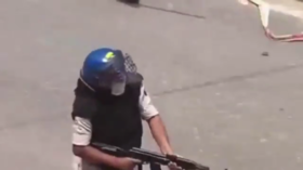 Indian cop who fired AK-47 at students suspended
