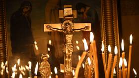Candles are seen in the Alexander Nevsky Catherdal in Simferopol, Russia, on January 7, 2026.