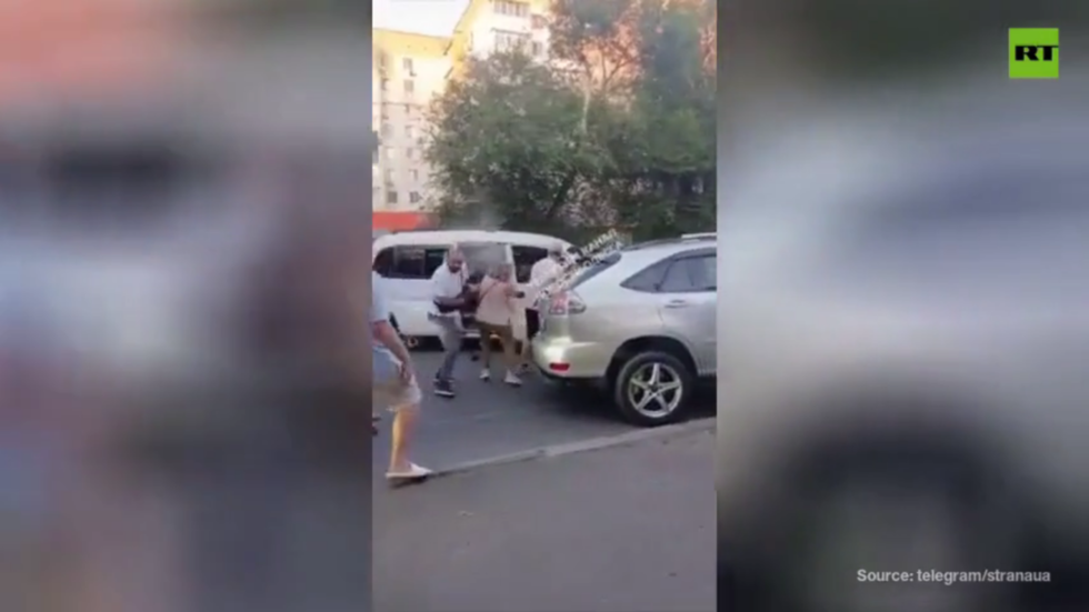 WATCH Ukrainian press gang tear-gas crowd trying to save man from conscription