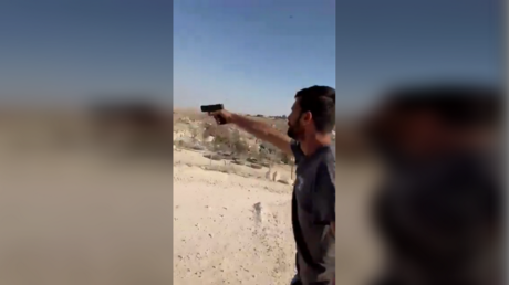 Pistol-wielding Jewish settler charged over death of West Bank community leader (VIDEOS)