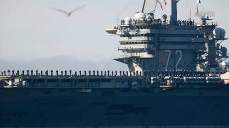 Burned-out US carrier sailors near Iran tried to jump overboard – Military Times