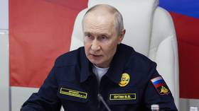 Russian President Vladimir Putin during a military meeting on board the cruiser Varyag of the Pacific Fleet.