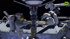 Astronauts replace critical ISS antenna during Spacewalk 97