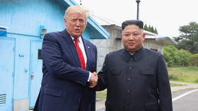 US President Donald Trump shakes hands with North Korean leader Kim Jong-un inside the demilitarized zone on June 30, 2019.