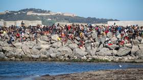 Spanish region demands answers after migrants land on crowded beach (VIDEOS)