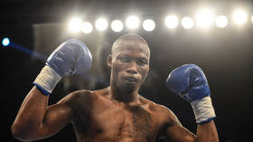 Two arrested over murder of boxing star